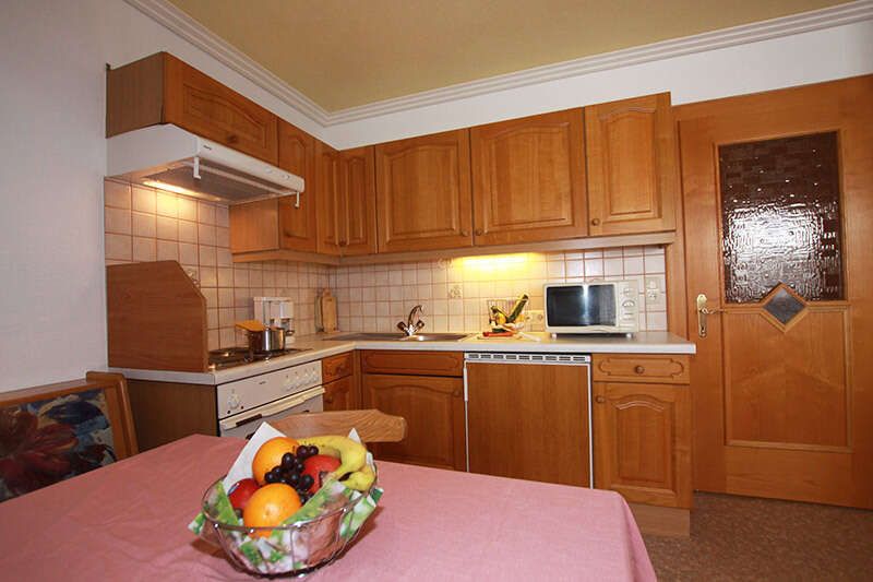 Kitchen with sitting area in apartment 3 in La Fontana
