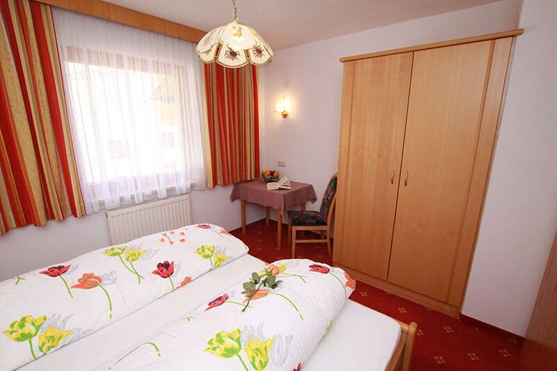 Double bed in apartment 3 at La Fontana