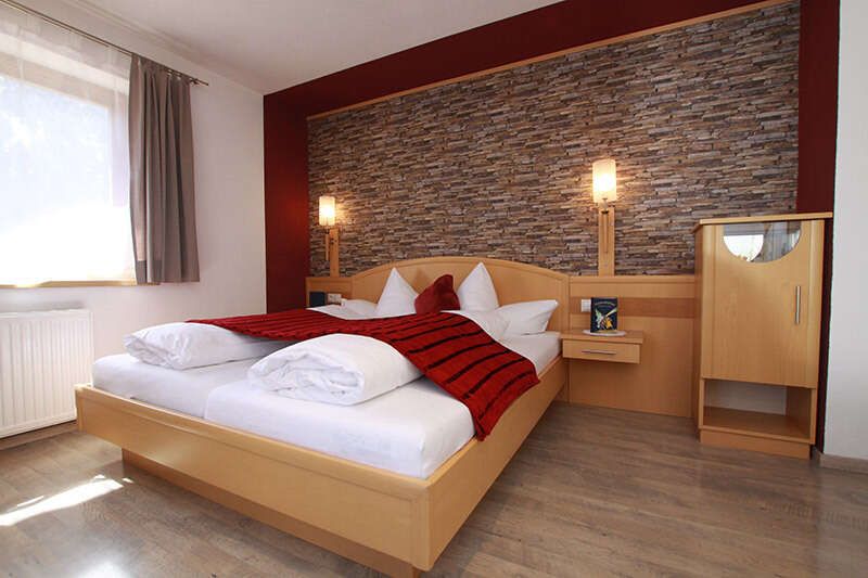 Schlafzimmer im Appartement 3 im Apart Miramonte